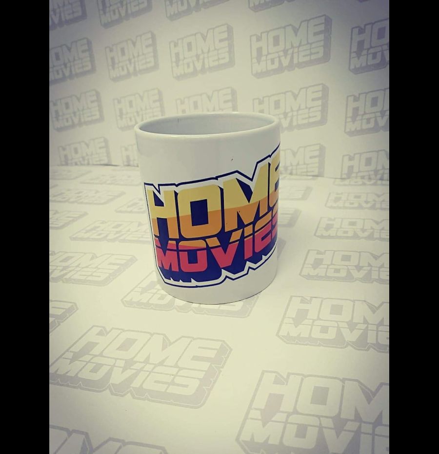 Home Movies Tazza da colazione con logo arancio